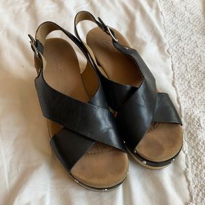 Black Clarks sandals with wooden heel